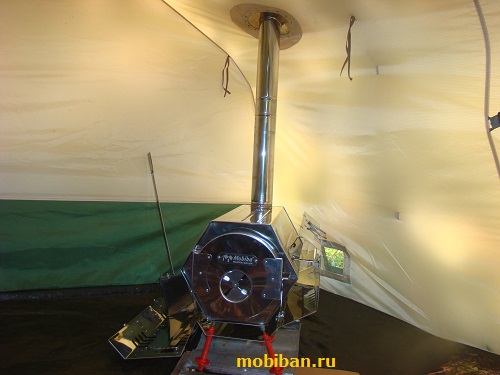 Внутри зимней палатки Роснар Р-34 с установленной печью «МегаСогра»